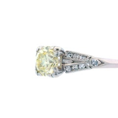 Art Deco Platinum and Fancy Yellow Diamond Engagement Ring