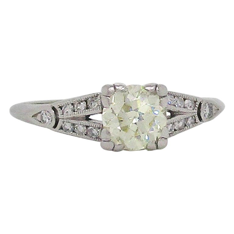Art Deco Platinum and Fancy Yellow Diamond Engagement Ring