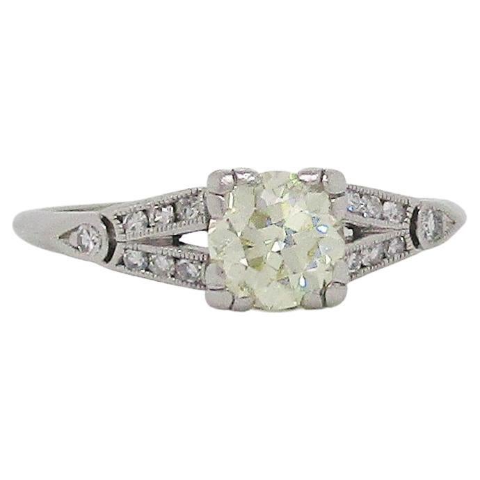 Art Deco Platinum and Fancy Yellow Diamond Engagement Ring For Sale