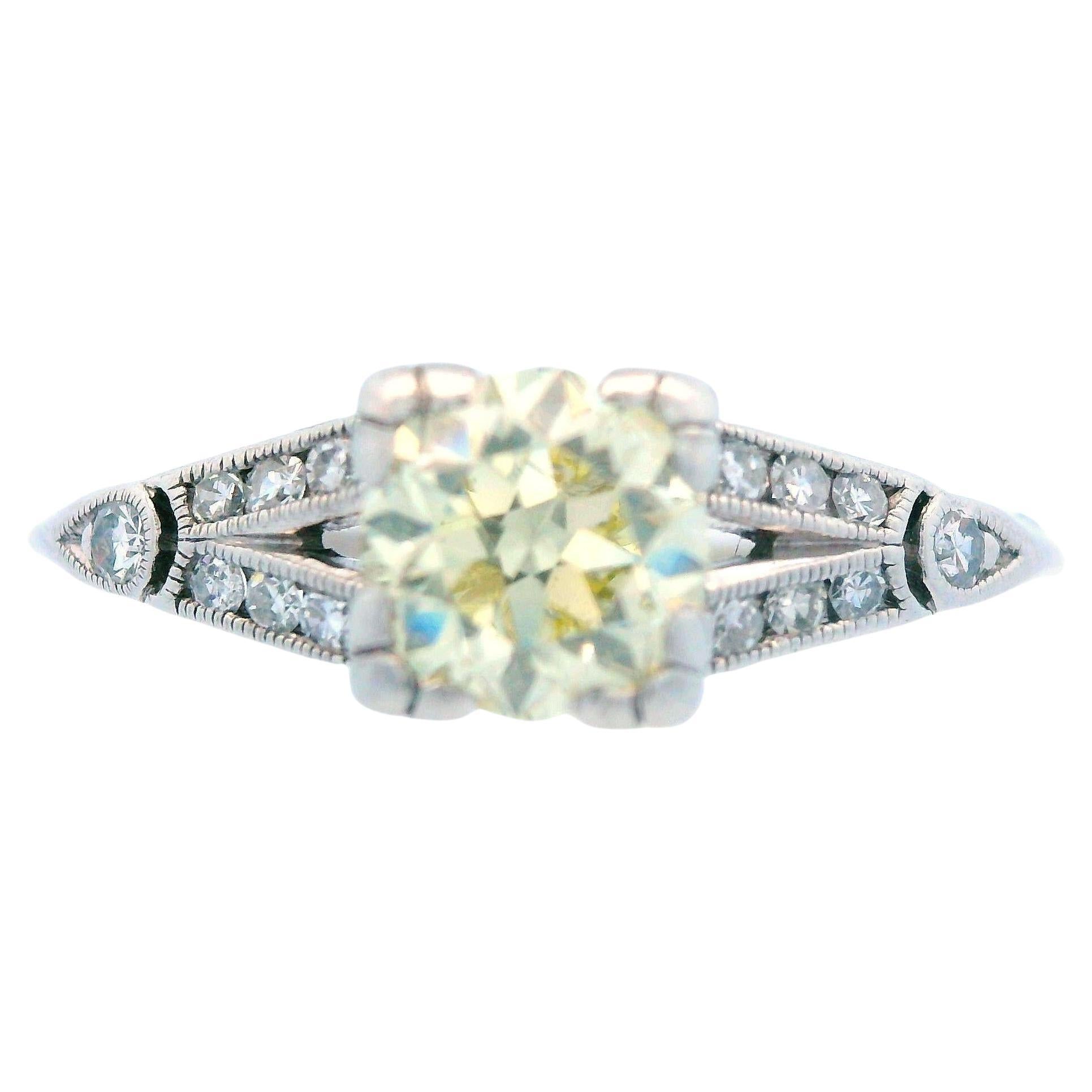 Art Deco Platinum and Fancy Yellow Diamond Engagement Ring