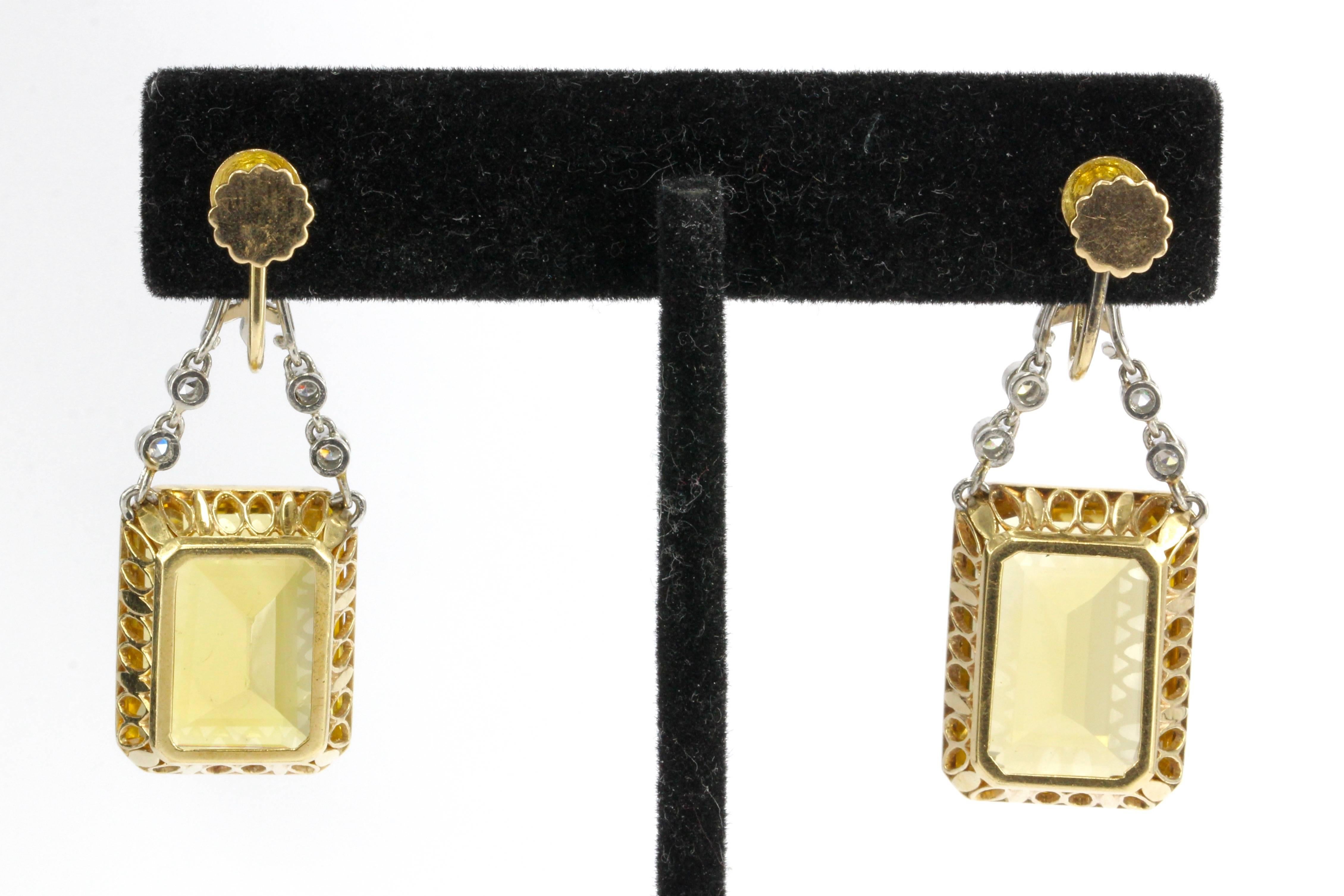 Era: Art Deco c.1930's

Screw backs for Non-pierced ears

Hallmarks: 14Kt on earring back

Composition: Platinum with 14K Yellow Gold

Primary Stone: Citrine

Stone Carat: Approximately 32 Carats

Accent Stone:  Diamonds

Color/Clarity: G/H -