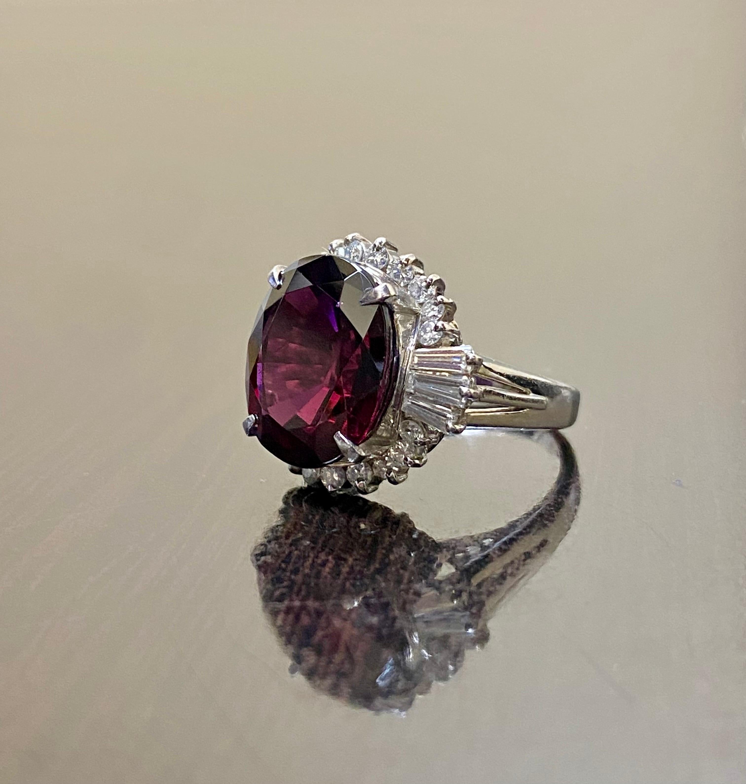 DeKara Designs Collection

Art Deco Inspired Extremely Elegant Vintage Inspired Oval Rhodolite Garnet Diamond Engagement Ring.

Metal- 90% Platinum, 10% Iridium.

Stones- Genuine Rhodolite Garnet 10.07 Carats. 20 Round Diamonds G-H Color SI1