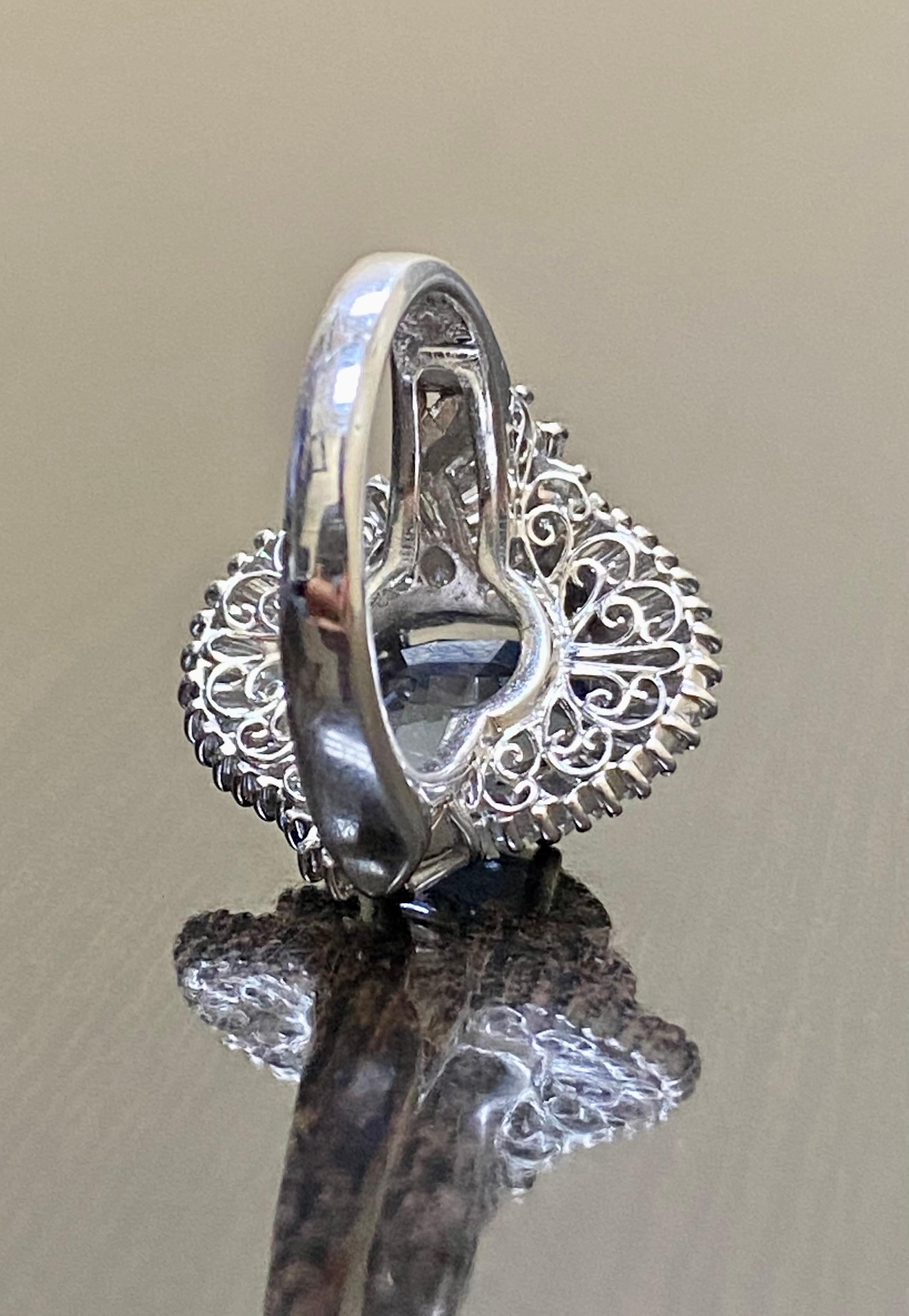 Women's Art Deco Platinum Baguette Diamond 5 Carat Oval Blue Spinel Engagement Ring For Sale