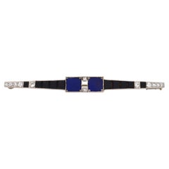 Broche Art déco en platine - Lapis-lazuli, onyx et diamants - CIRCA 1920