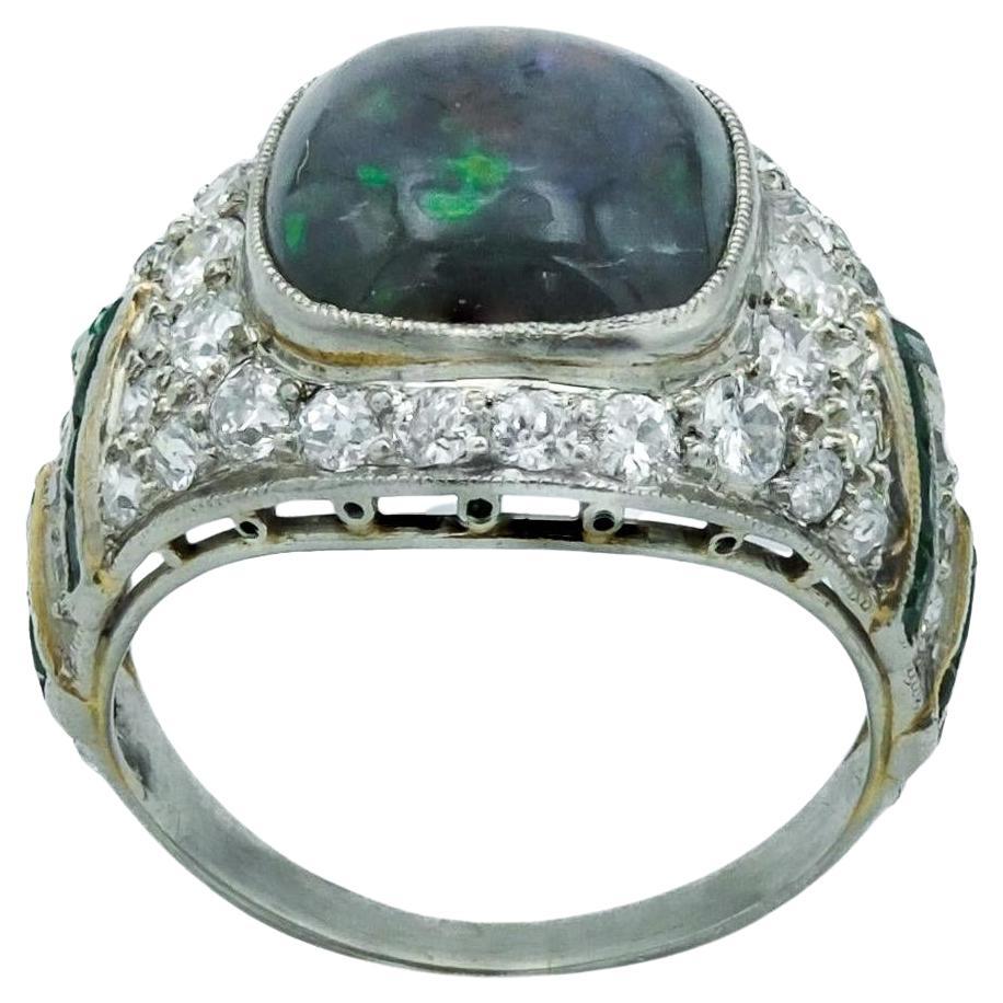 Art Deco Platinum Black Opal, Diamond and Emerald Cocktail Ring For Sale