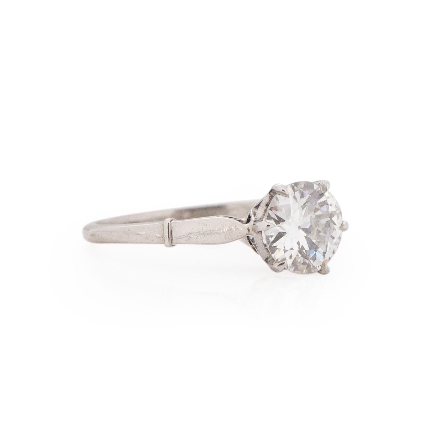 Here we have an elegant art deco engagement ring that shows off beautiful gallery details. The center diamond is SI1 .86 carat circular brilliant cut that has ample amounts of life waiting for another adventure. The shanks have small details that