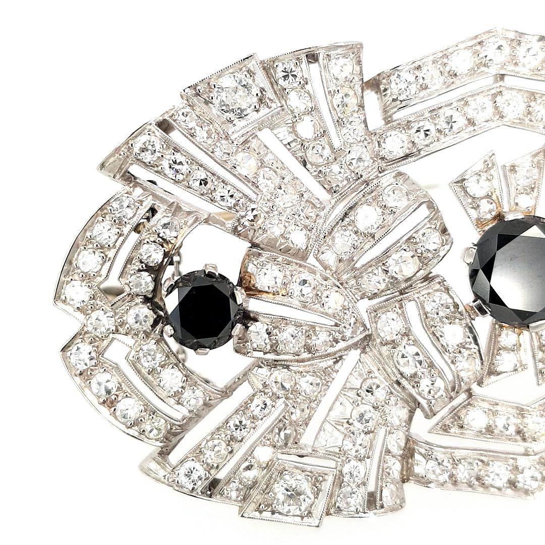 Women's Art Deco Platinum Brooch, 3.70ct Black Diamonds and 5ct White Diamonds For Sale