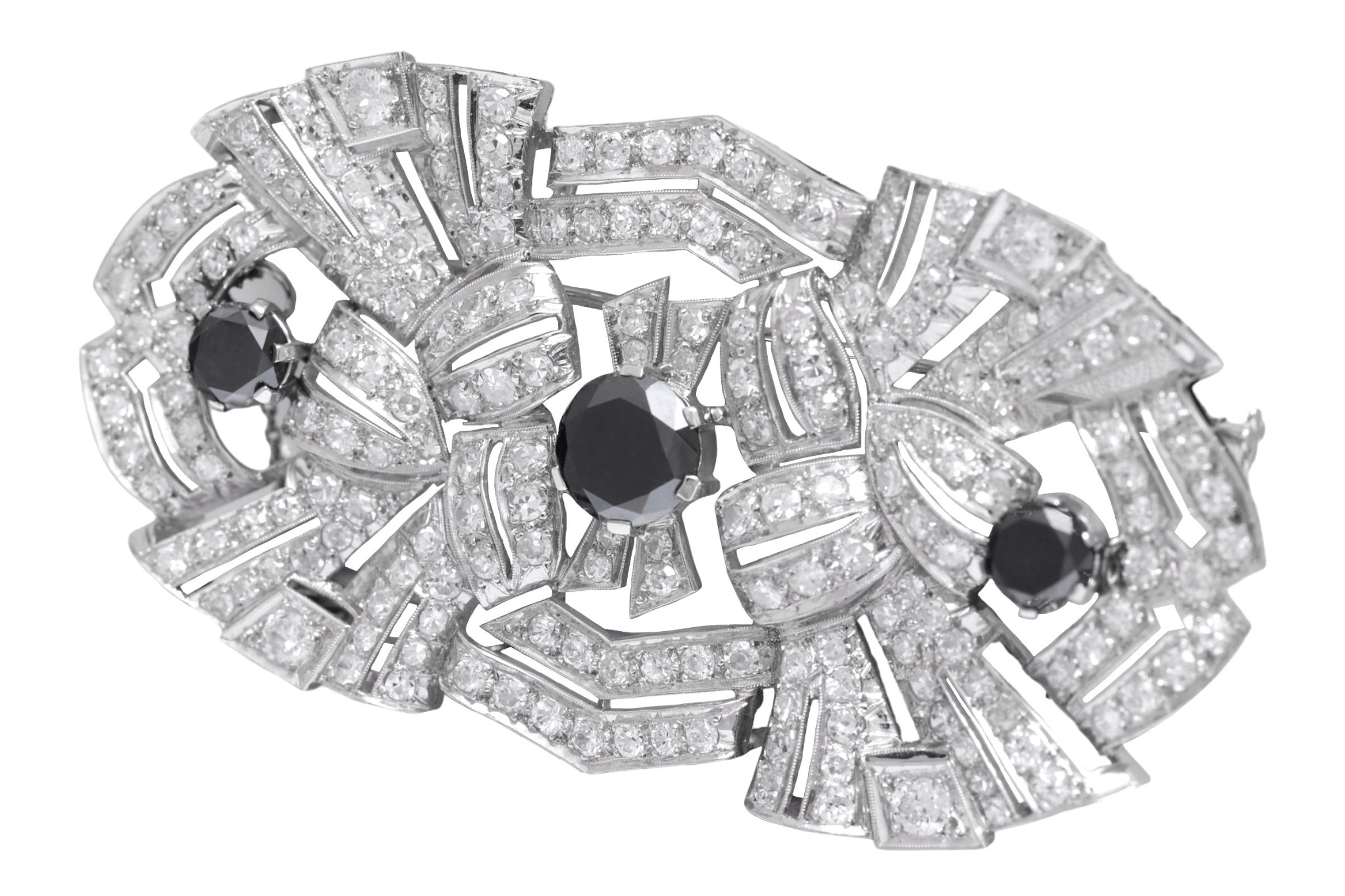 Broche Art Déco de platino, 3,70 ct de diamantes negros y 5 ct de diamantes blancos Art Decó en venta