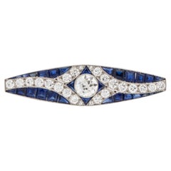Art Deco Platinum Calibré-Cut Sapphire and Diamond Bar Pin