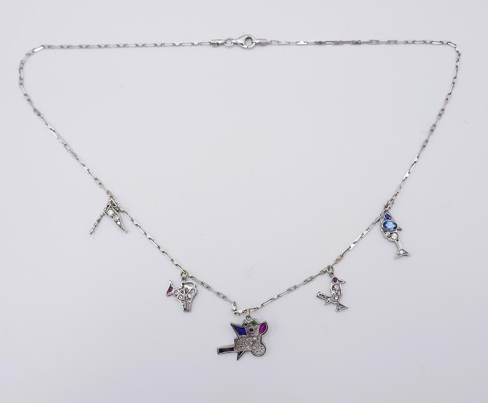 Art Deco Platinum Charm Necklace on White Gold Chain In Good Condition In Beverly Hills, CA