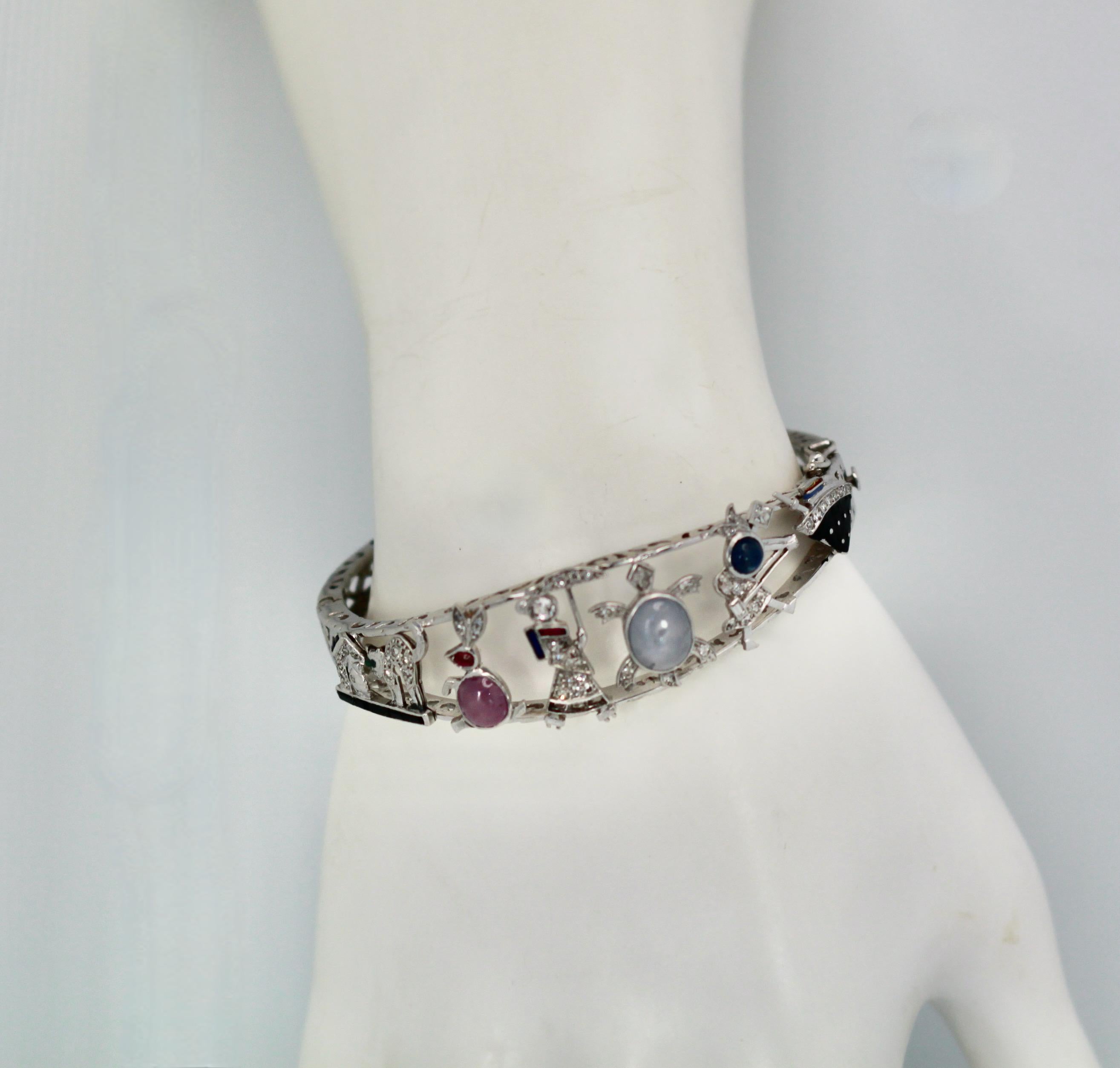 Art Deco Platinum Charms on Bracelet In Excellent Condition For Sale In North Hollywood, CA