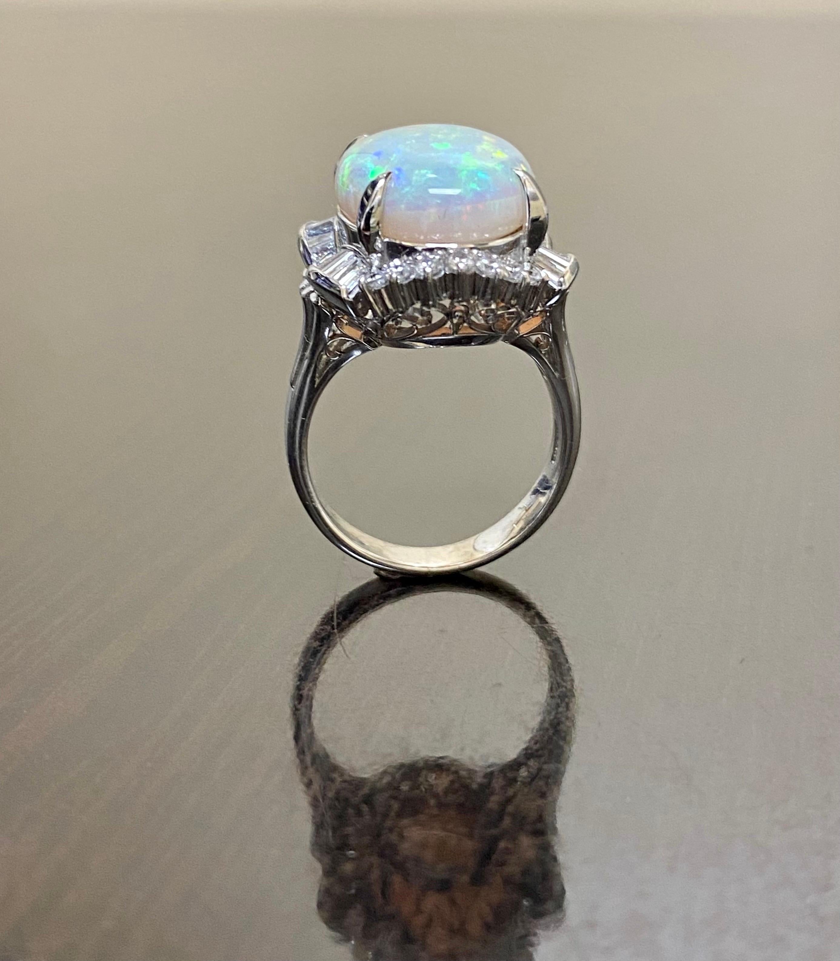 DeKara Designs Collection

Our latest design! An entirely handmade ONE OF A KIND elegant and lustrous 10.77 Carat Australian Opal surrounded by beautiful round and baguette diamonds in a platinum setting.

Metal- 90% Platinum, 10%
