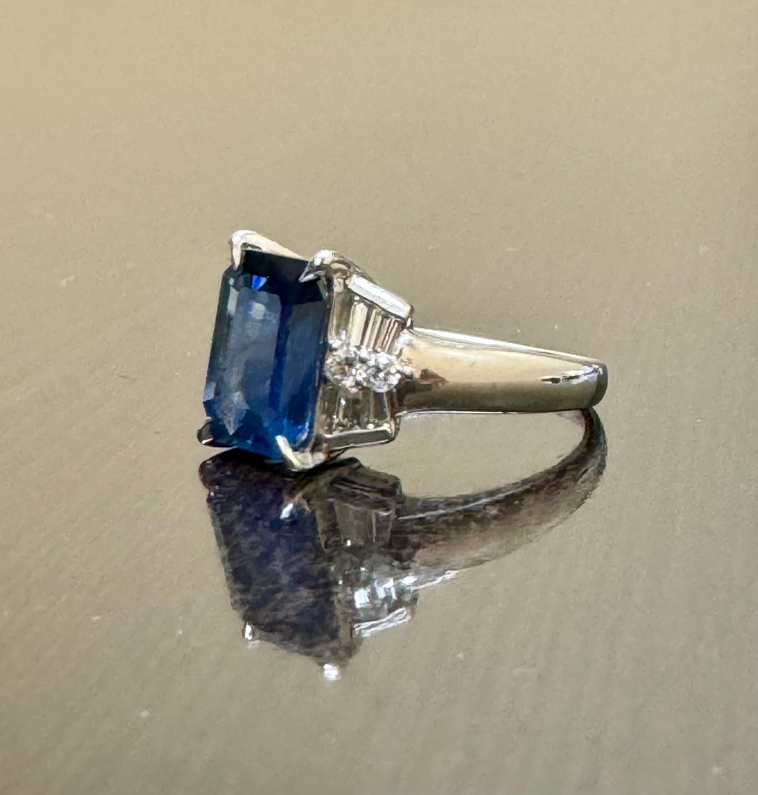 Art Deco Platinum Diamond 4.26 Carat Emerald Cut Blue Sapphire Engagement Ring For Sale 1