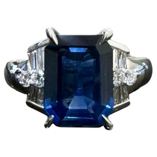 Art Deco Platinum Diamond 4.26 Carat Emerald Cut Blue Sapphire Engagement Ring For Sale