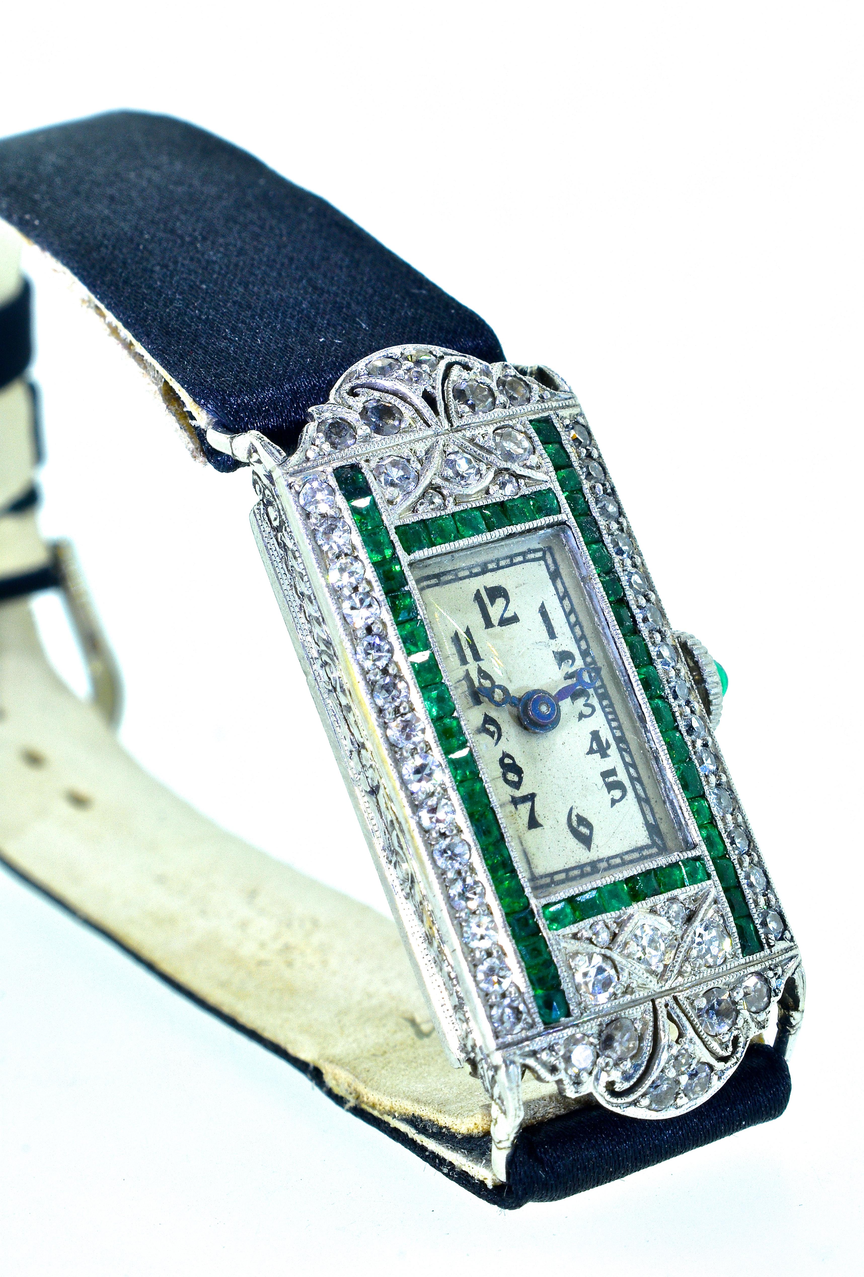 Emerald Cut Art Deco Platinum, Diamond and Emerald Wristwatch, circa 1920