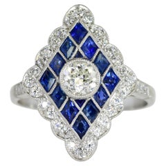 Art Deco Platinum, Diamond and Fancy cut Sapphire Ring, c. 1920.