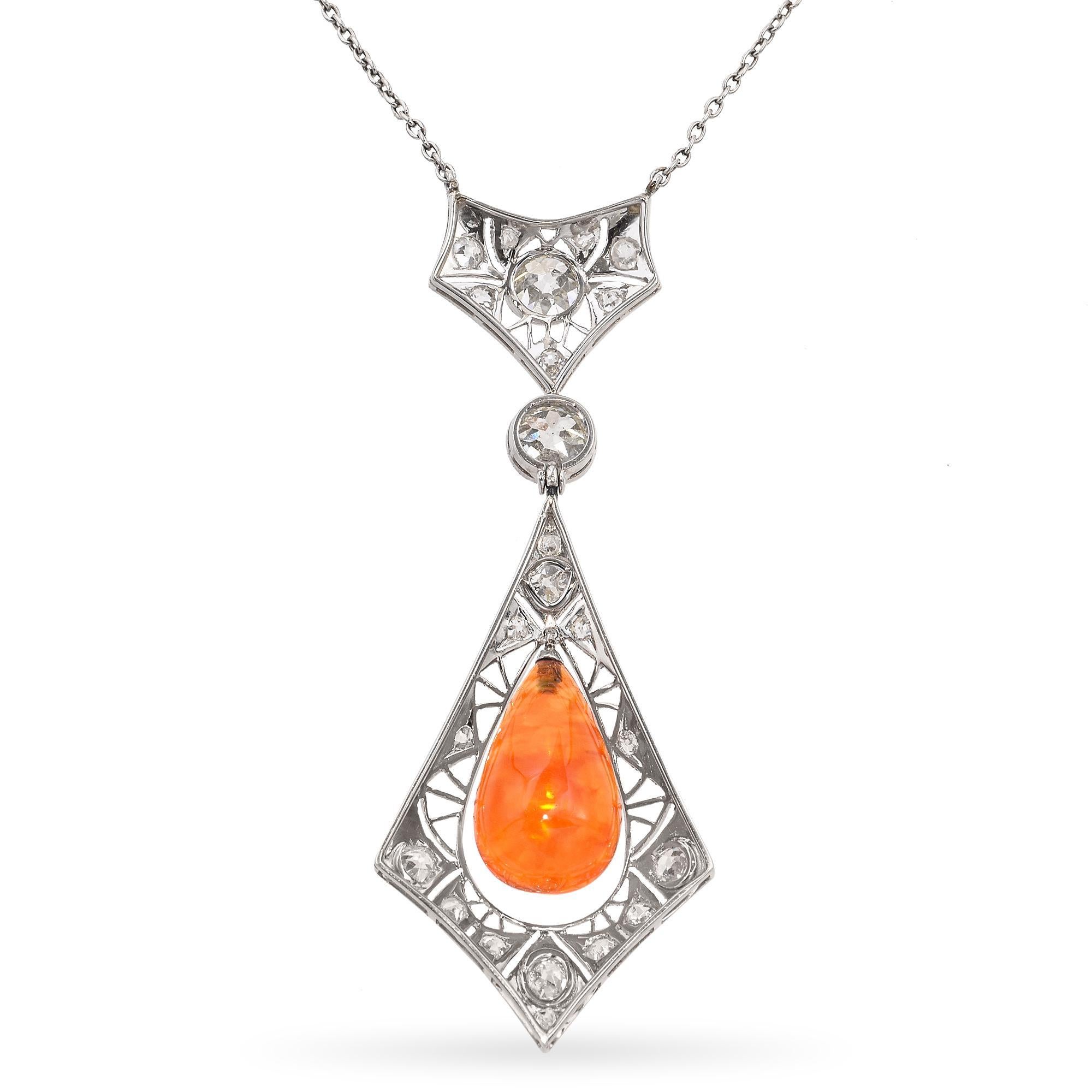 A breathtaking testament to the glamour of the Art Deco era, this platinum filigree necklace showcases a fiery teardrop-shaped Mexican fire opal, glowing like a captured ember. Framed by a meticulously crafted lattice of old European-cut diamonds,