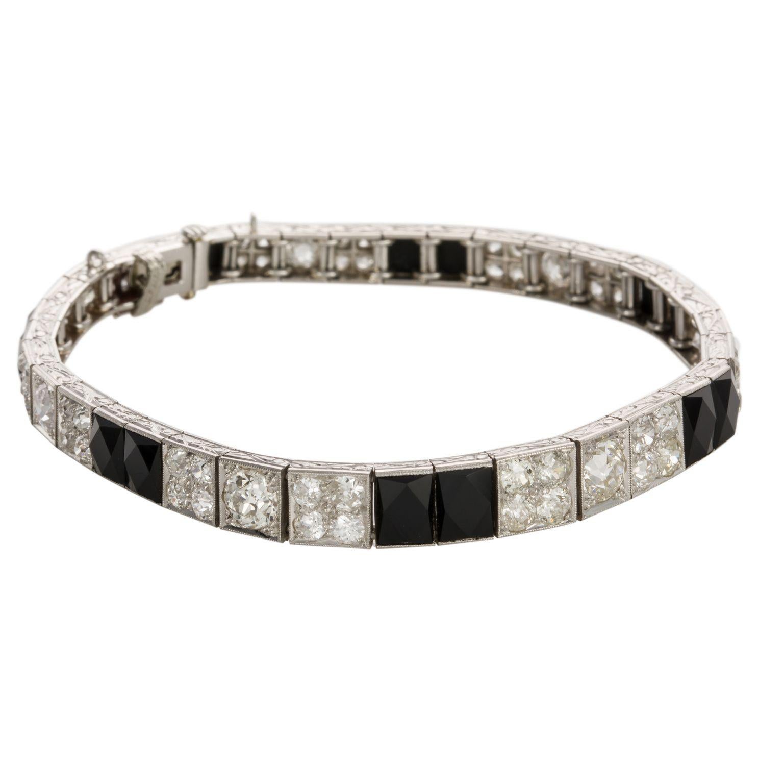 Art Deco Platinum Diamond and Onyx Engraved Line Bracelet For Sale 11