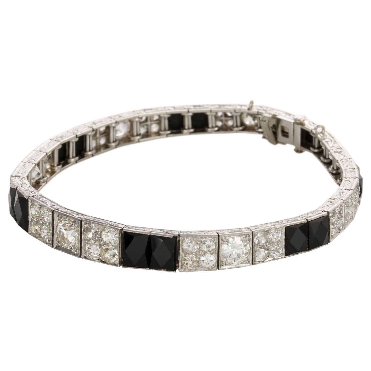 Art Deco Platinum Diamond and Onyx Engraved Line Bracelet For Sale 12