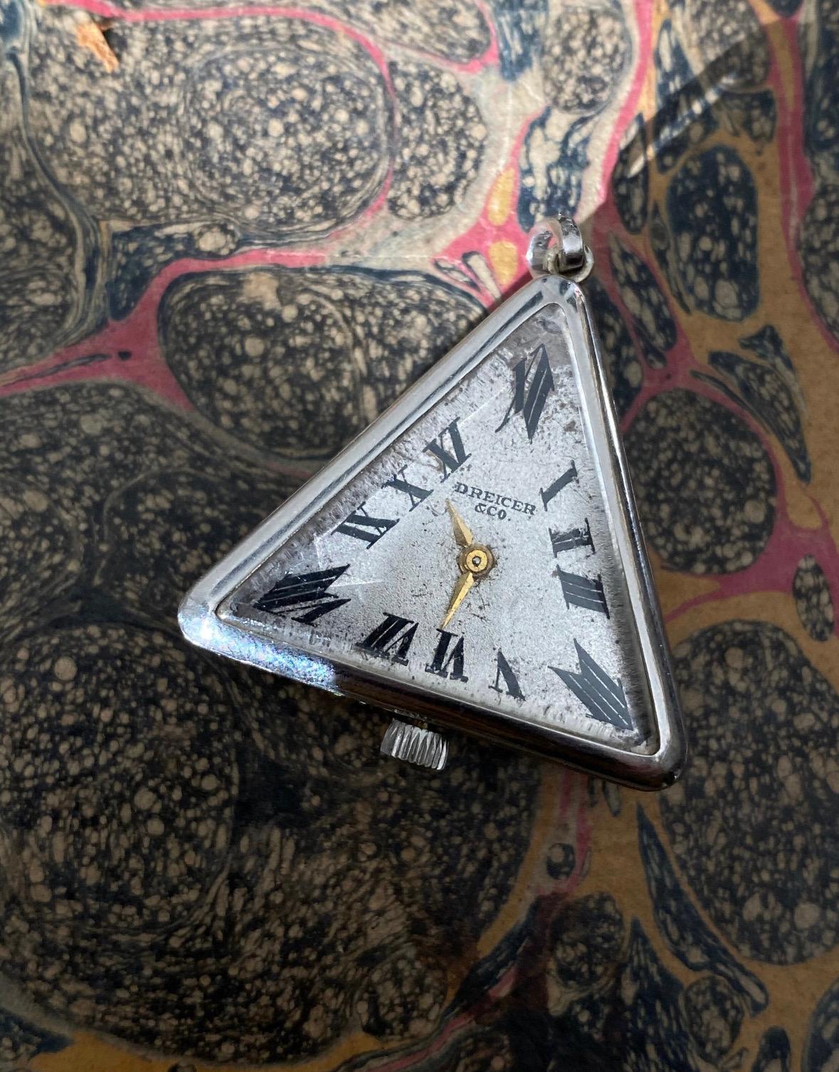 Women's or Men's Art Deco Platinum, Diamond and Onyx Pendant Watch by Dreicer and Co. For Sale
