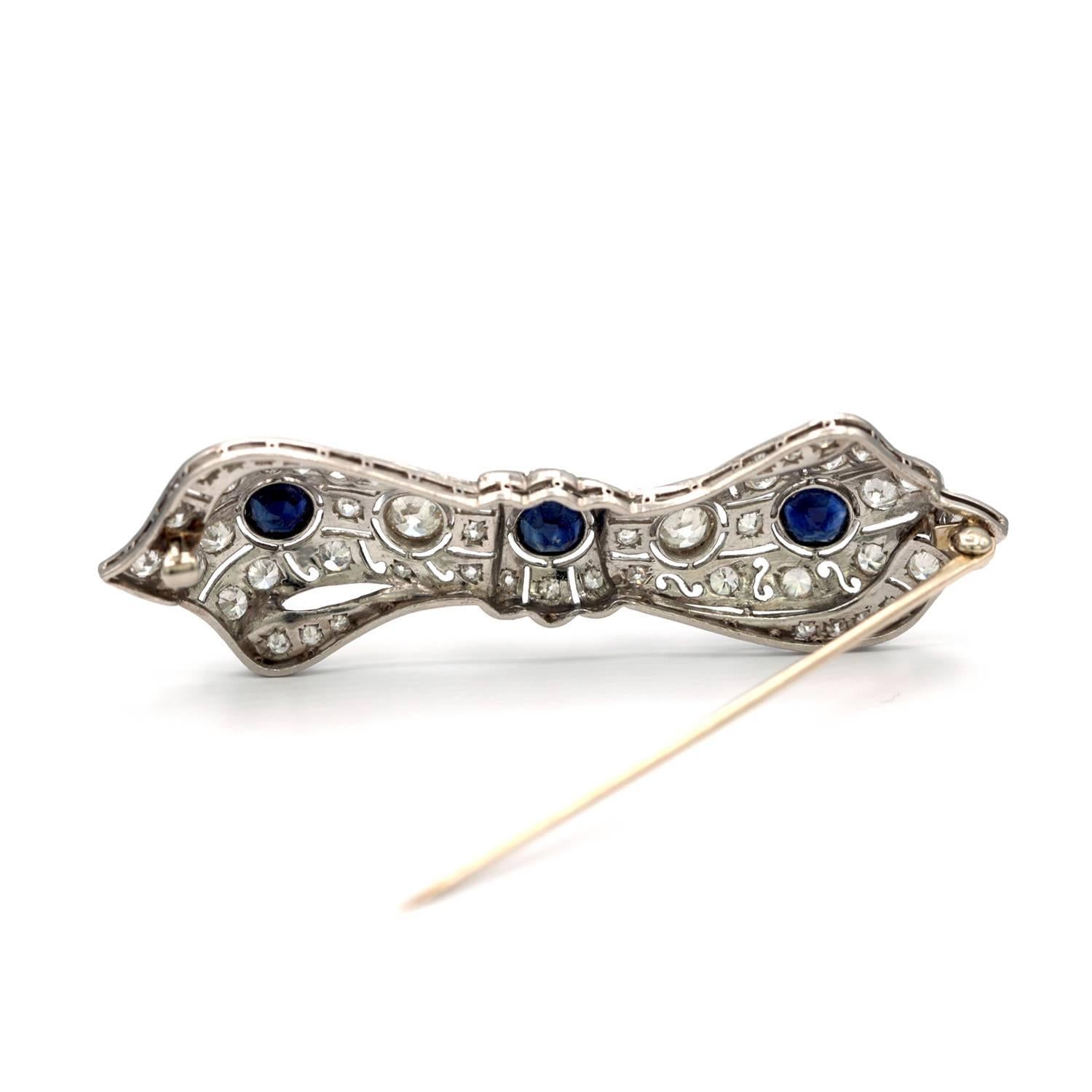 Women's Art Deco Platinum Diamond and Sapphire Brooch For Sale