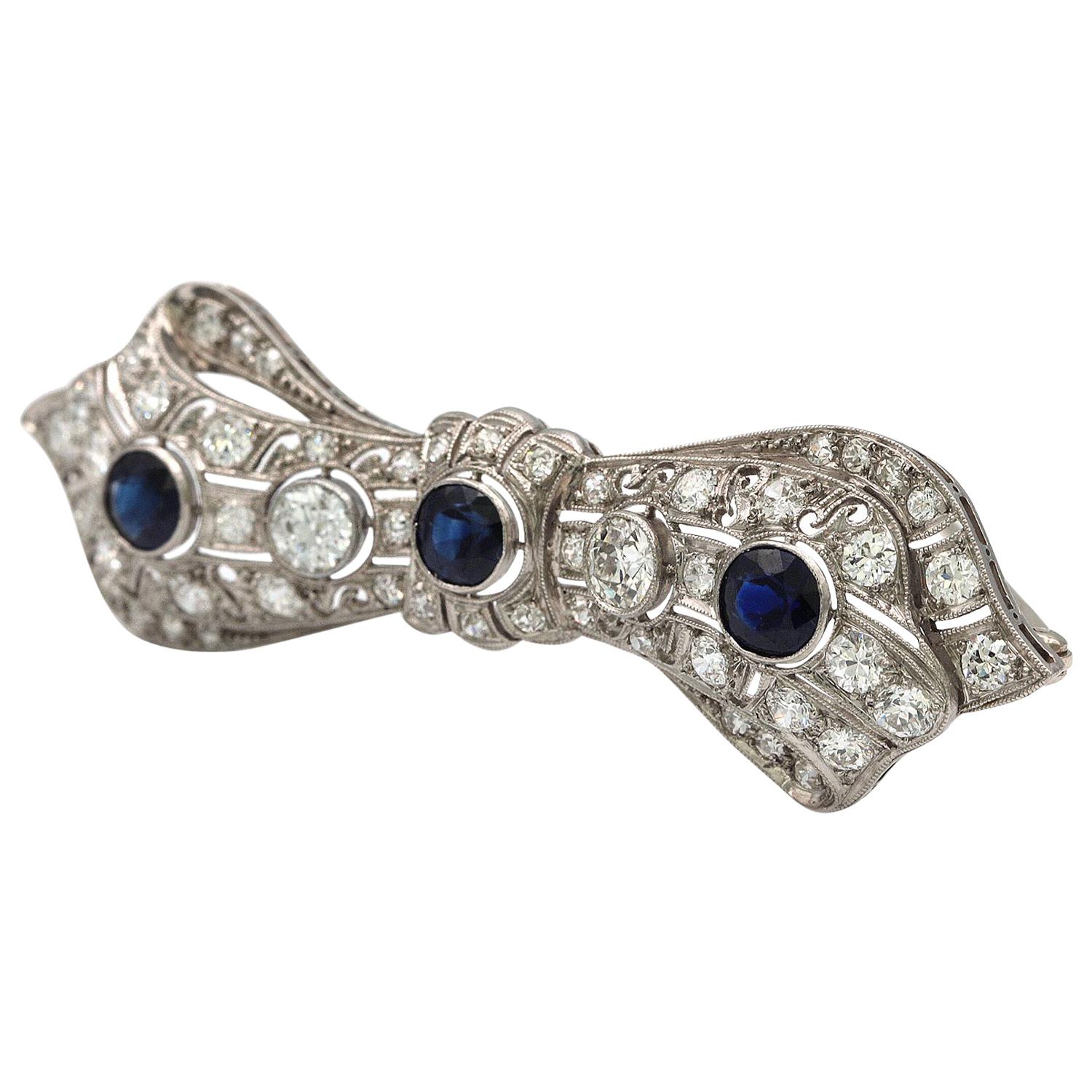 Art Deco Platinum Diamond and Sapphire Brooch For Sale