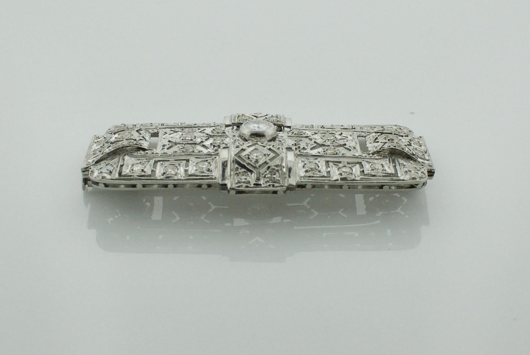 Round Cut Art Deco Platinum Diamond Brooch, circa 1930s For Sale