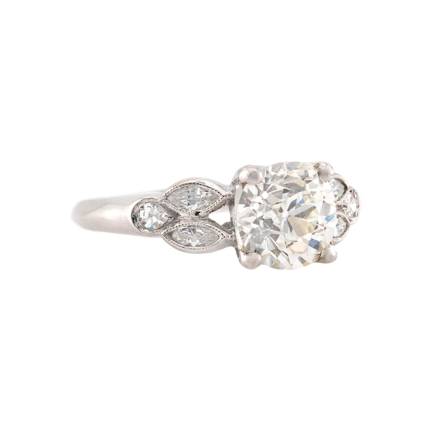 A breathtaking diamond engagement ring from the Art Deco (ca1920) era! Crafted in platinum, this gorgeous ring features a marvelous 1.73ct old European cut diamond, which is held within a four-prong setting. The stone displays H color and VS1