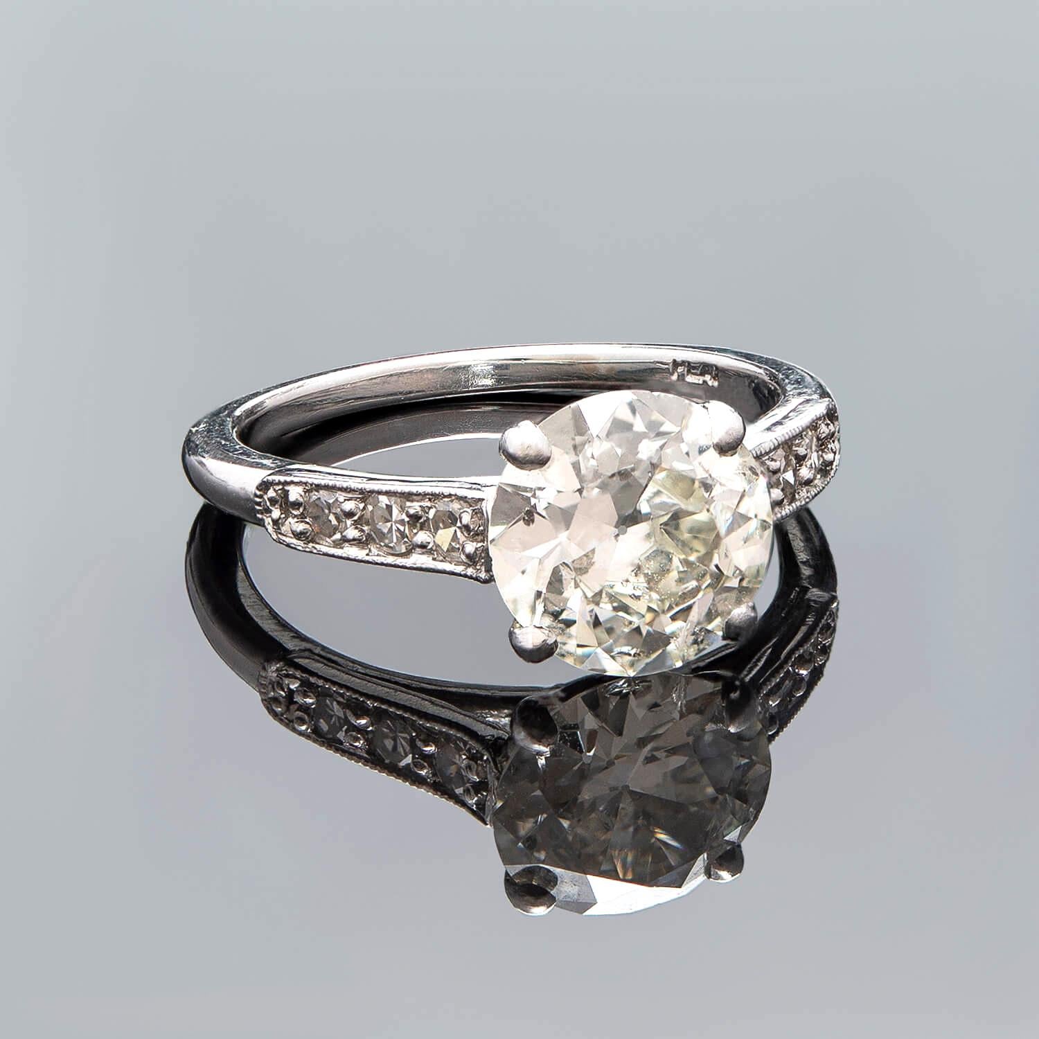 A gorgeous diamond engagement ring from the Art Deco (ca1930) era! This stunning piece has a classic platinum mounting that holds a sparkling diamond stone at the center. The old European Cut diamond is four-prong set and has a total weight of