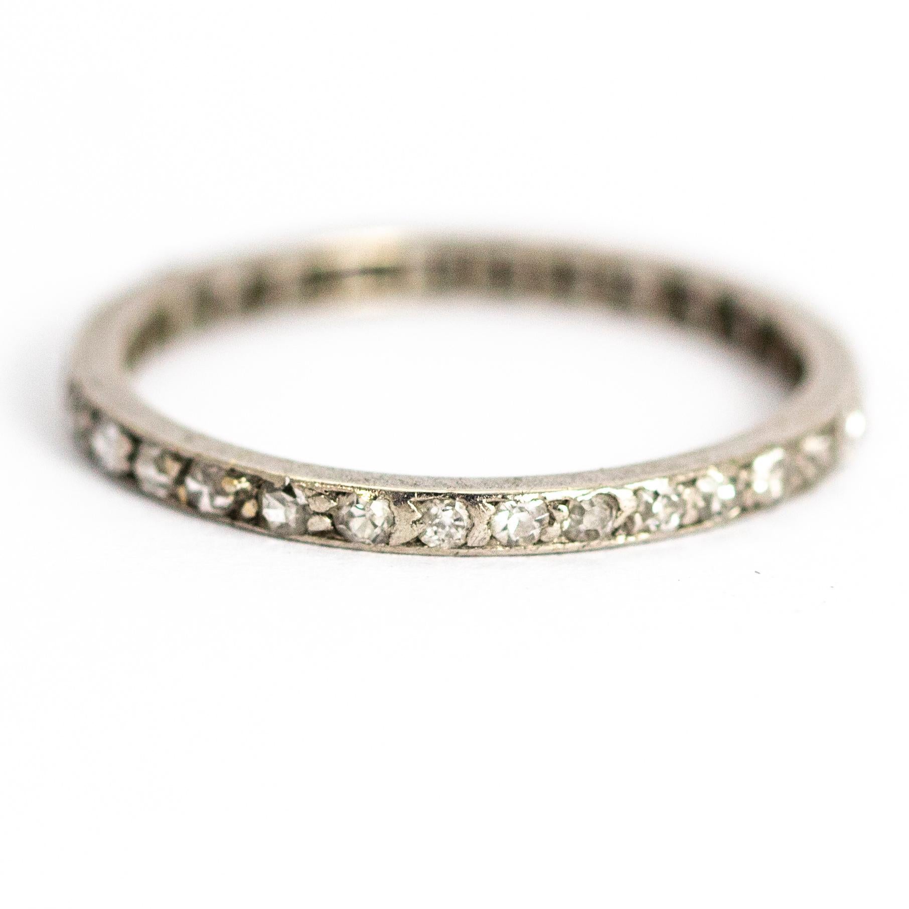 A beautiful eternity band dating from the Art Deco period circa 1915. The ring is fully set with stunning old European cut white diamonds. Modelled in platinum.

Ring Size: UK M 1/2, US 6 3/4

Band Width: 1.74mm

Band Depth: 1.51mm