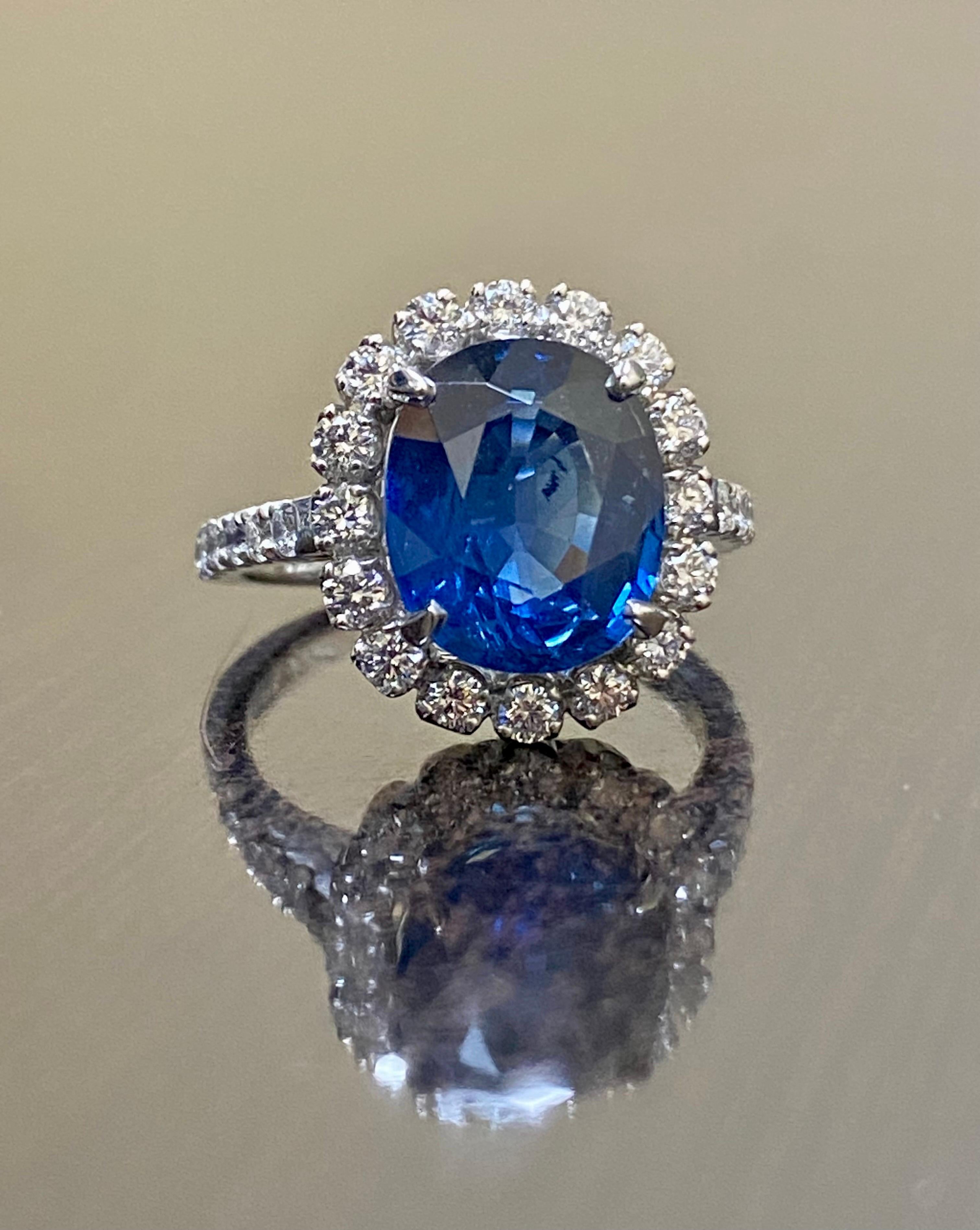 DeKara Designs Collection

Our latest design! An elegant and lustrous Oval Blue Sapphire surrounded beautifully by diamonds in a halo setting.

Metal- 90% Platinum, 10% Iridium.

Stones- Genuine Oval Blue Sapphire 5.33 Carats, 28 Round Diamonds F-G