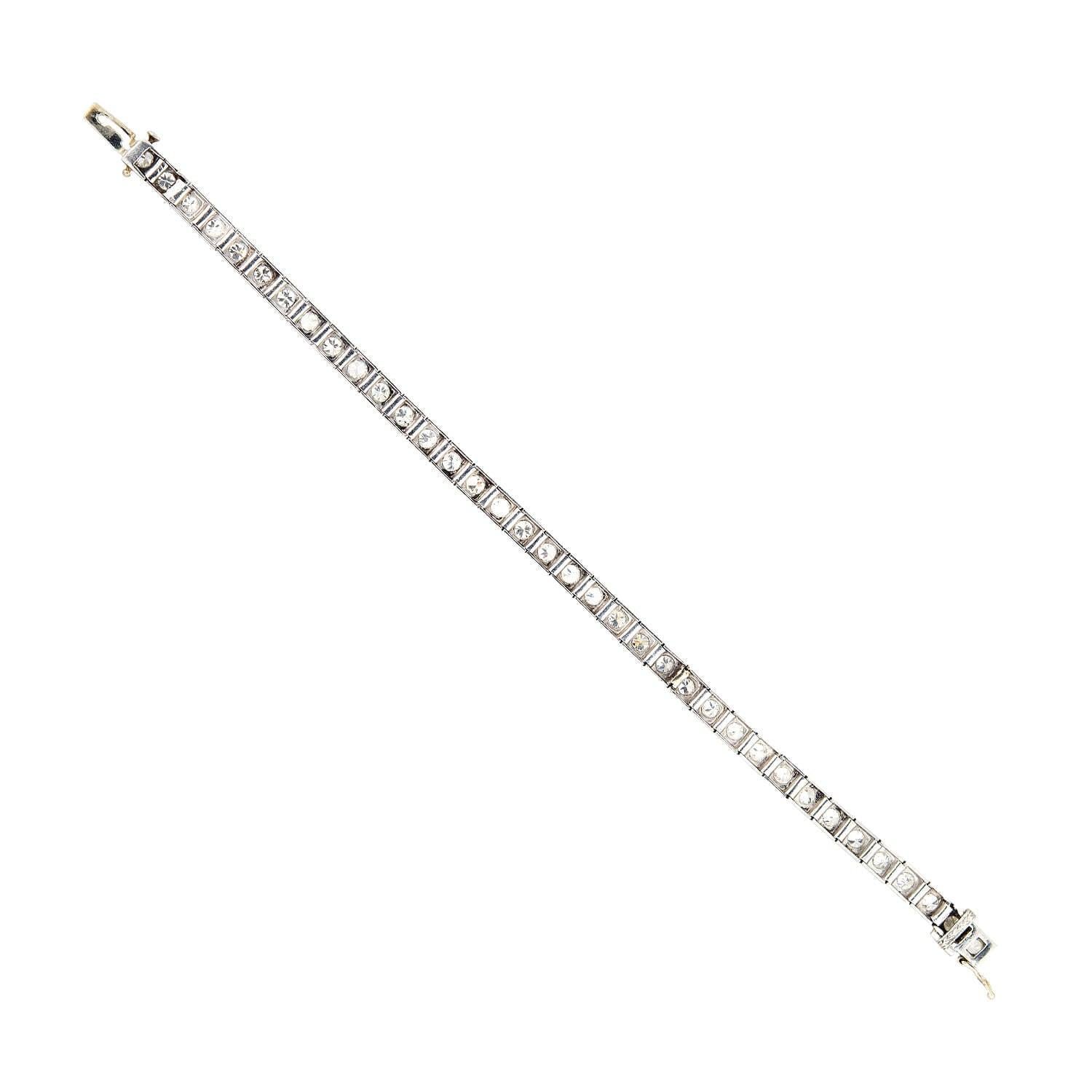 An incredible diamond line bracelet from the Art Deco (ca1920s) era! Crafted in platinum, this gorgeous piece is comprised of 36 total links, each adorned with a glittering Old European Cut diamond. The sparkling diamonds are prong-set within