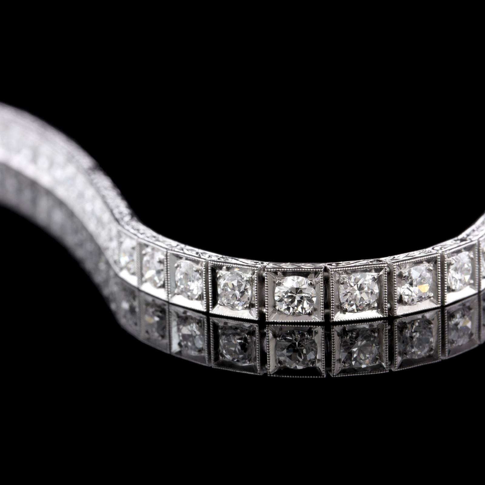 Art Deco Platinum Diamond Line Bracelet. The bracelet is bead set with 35 old European and old mine cut diamonds, approx. total wt. 4.00cts., HI color, VS2-SI1 clarity, millgrained and engraved accents, length 7 1/8