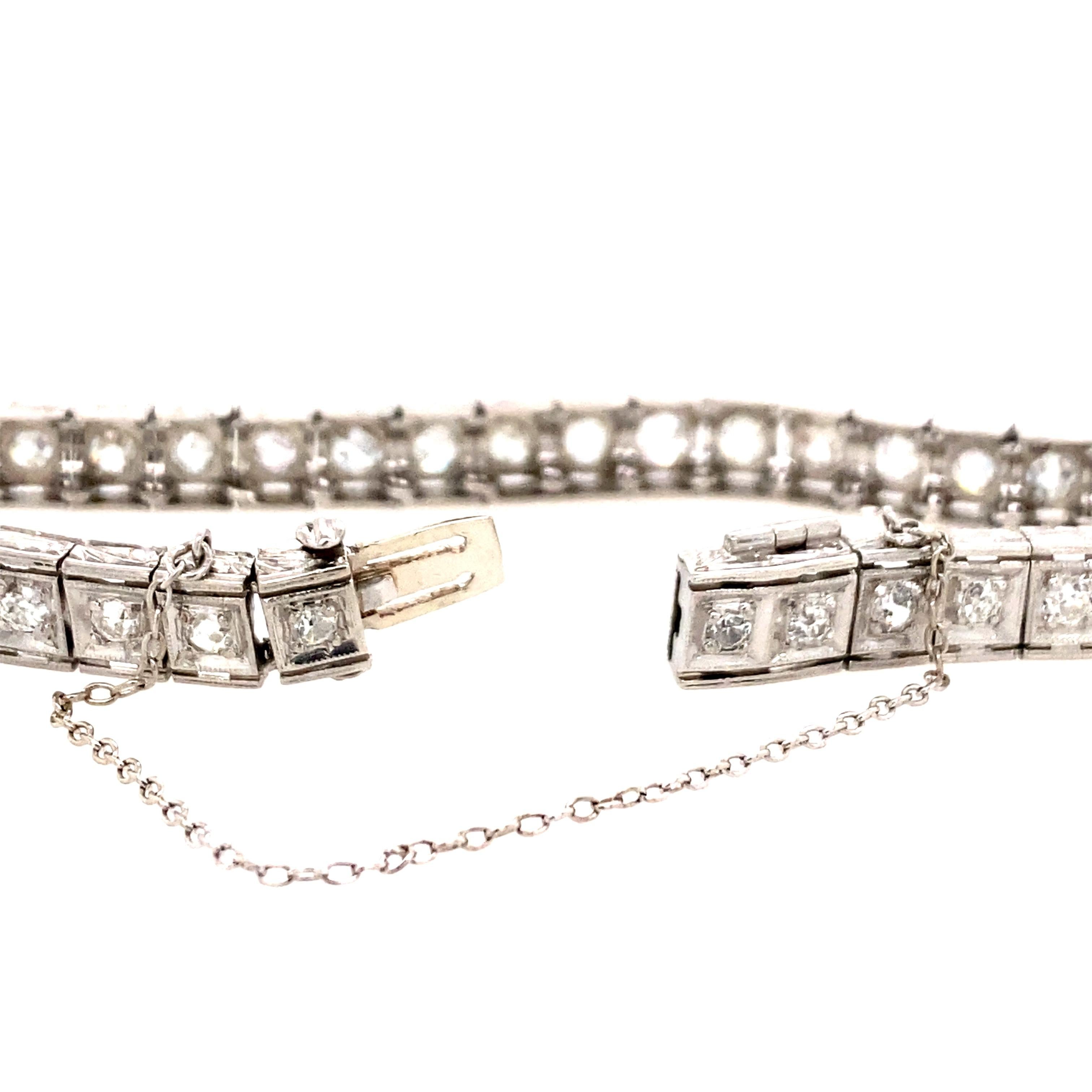 One estate platinum diamond line bracelet with forty Old European cut diamonds set in square shaped settings, 3.50 carats total weight with matching H/I color and SI1/SI2 clarity. The bracelet measures 7.25 inches in length, weighs 21.5 grams and