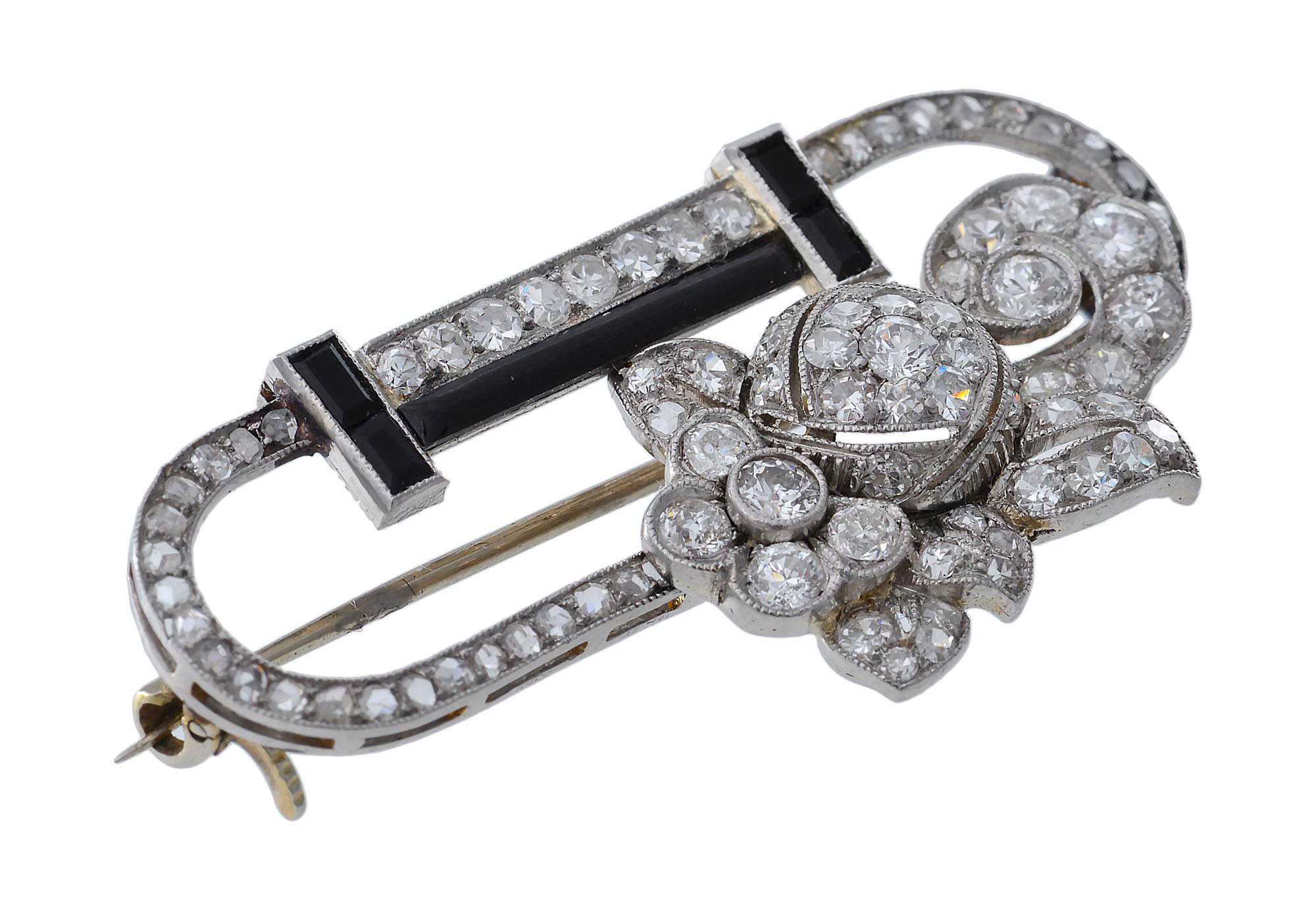Art Deco Platinum, Diamond, Onyx and Diamond Stylized Brooch In Good Condition For Sale In Melbourne, Victoria