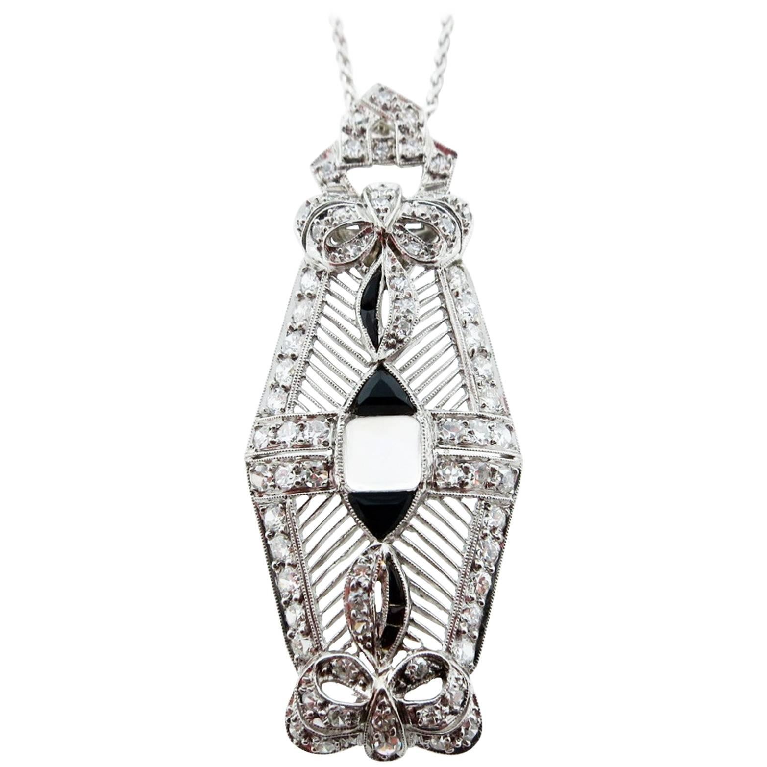 Art Deco Platinum Diamond Onyx and Moonstone Pendant