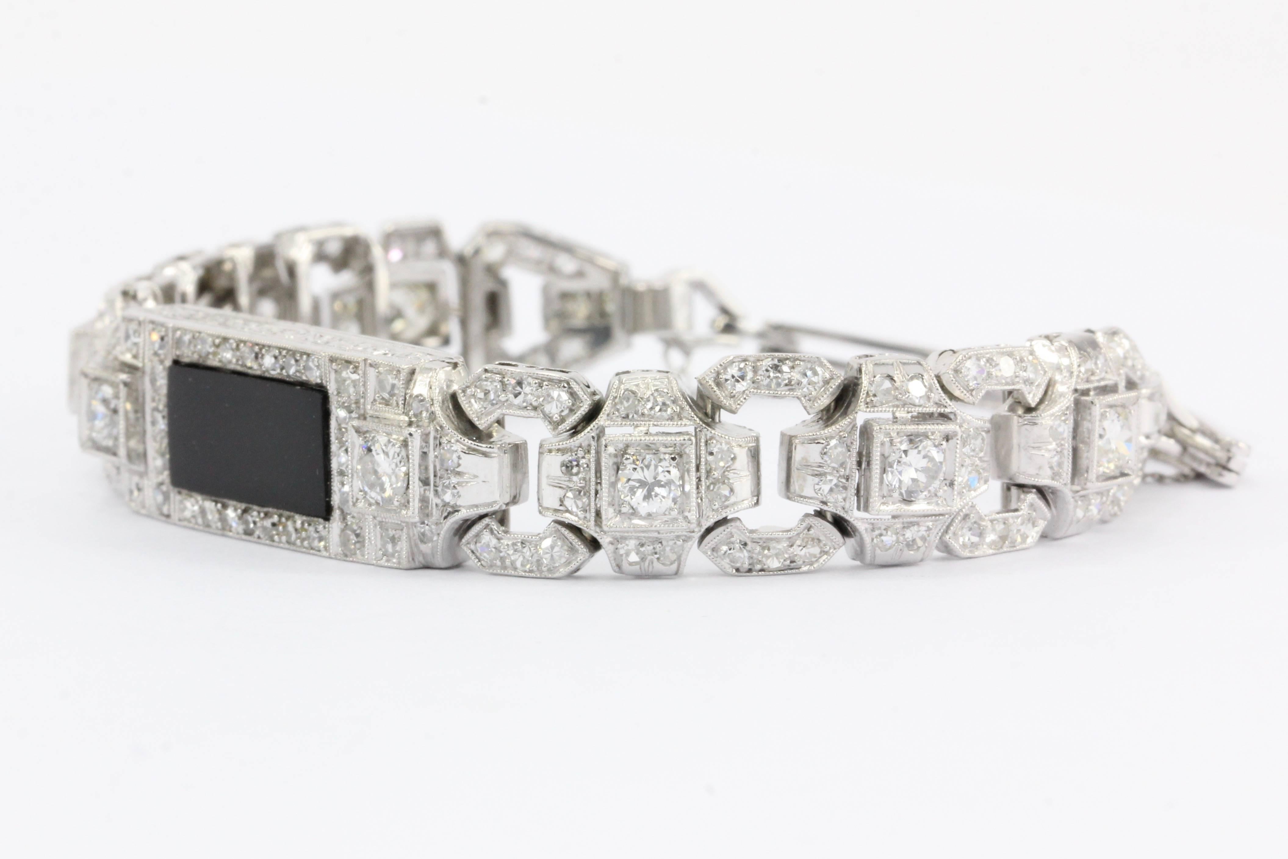 Era: Art Deco c.1930's (recently converted to bracelet from watch)

Hallmarks: MG 950

Composition: platinum

Primary Stone: 140 Diamonds 

Stone Carat: Approximately 3 carats total 

Color / Clarity: G/I - Vs2/Si2

Bracelet length: 6.9