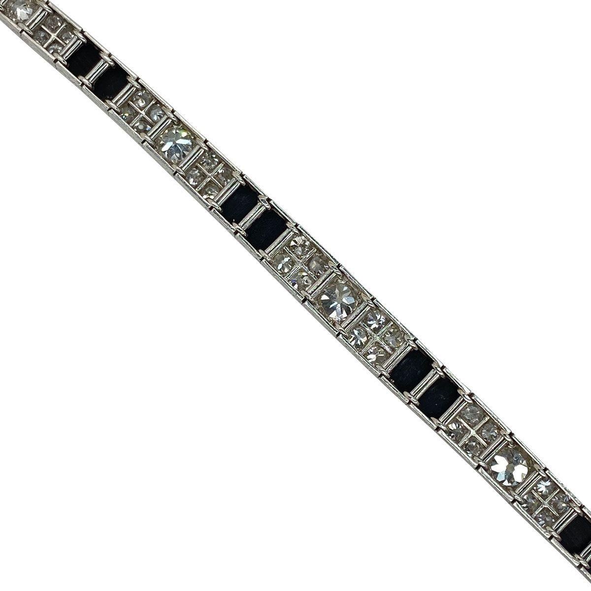 Art Deco Platinum Diamond and Onyx Engraved Line Bracelet For Sale 5