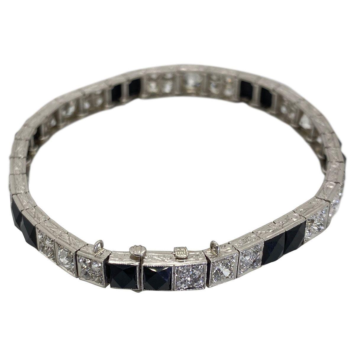 Old European Cut Art Deco Platinum Diamond and Onyx Engraved Line Bracelet For Sale