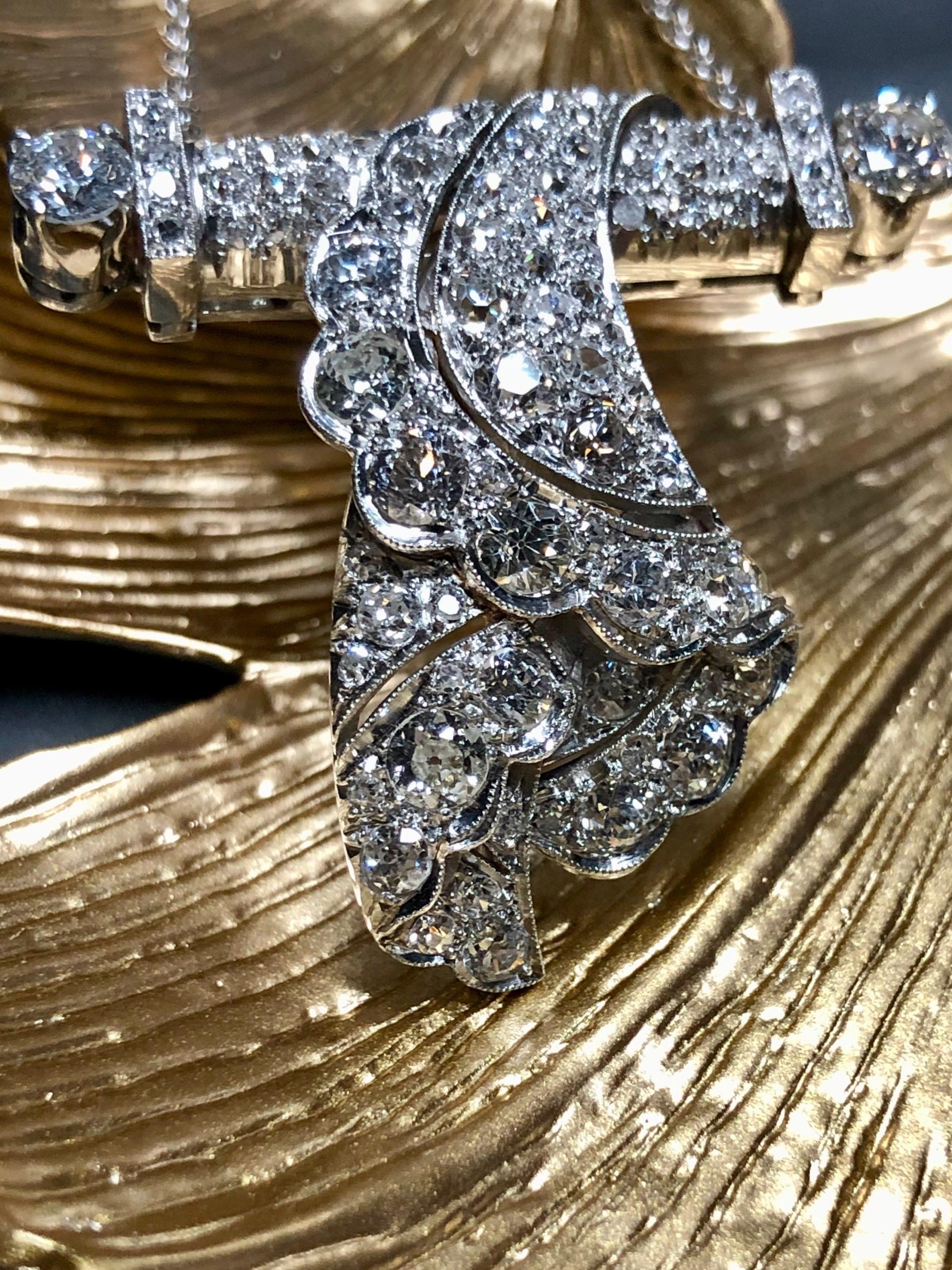 This beautiful pendant started it’s life originally as a brooch but has recently been converted by its previous owner. Being an original Art Deco piece, all of the diamonds are Old European cuts and range F to J in color and Vs1 to Si2 in clarity
