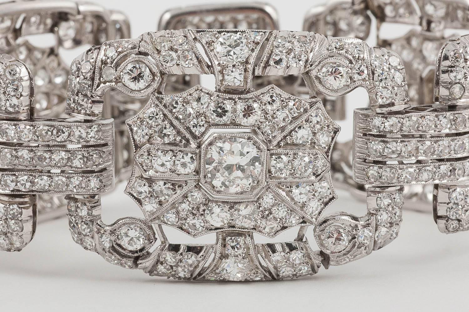 A very powerful and uber Art Deco diamond plaque bracelet that shopcases the ultimate in Art Deco design. Mounted in platinum and set with sparking white diamonds consistent with the age and style of the bangle.  

I am retiring from the period