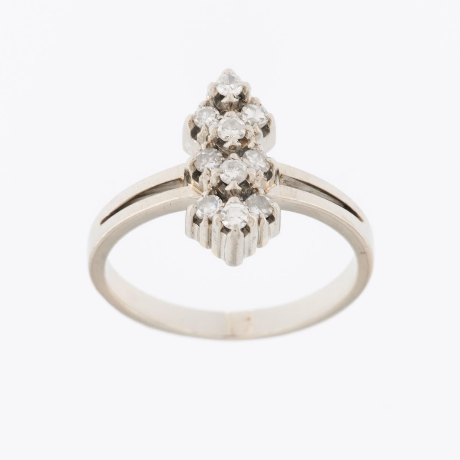 The Art Deco Platinum Diamond Ring is a stunning and timeless piece of jewelry that embodies the design aesthetic of the Art Deco era, which peaked in popularity during the 1920s and 1930s. 

The ring is made of platinum, a precious metal known for