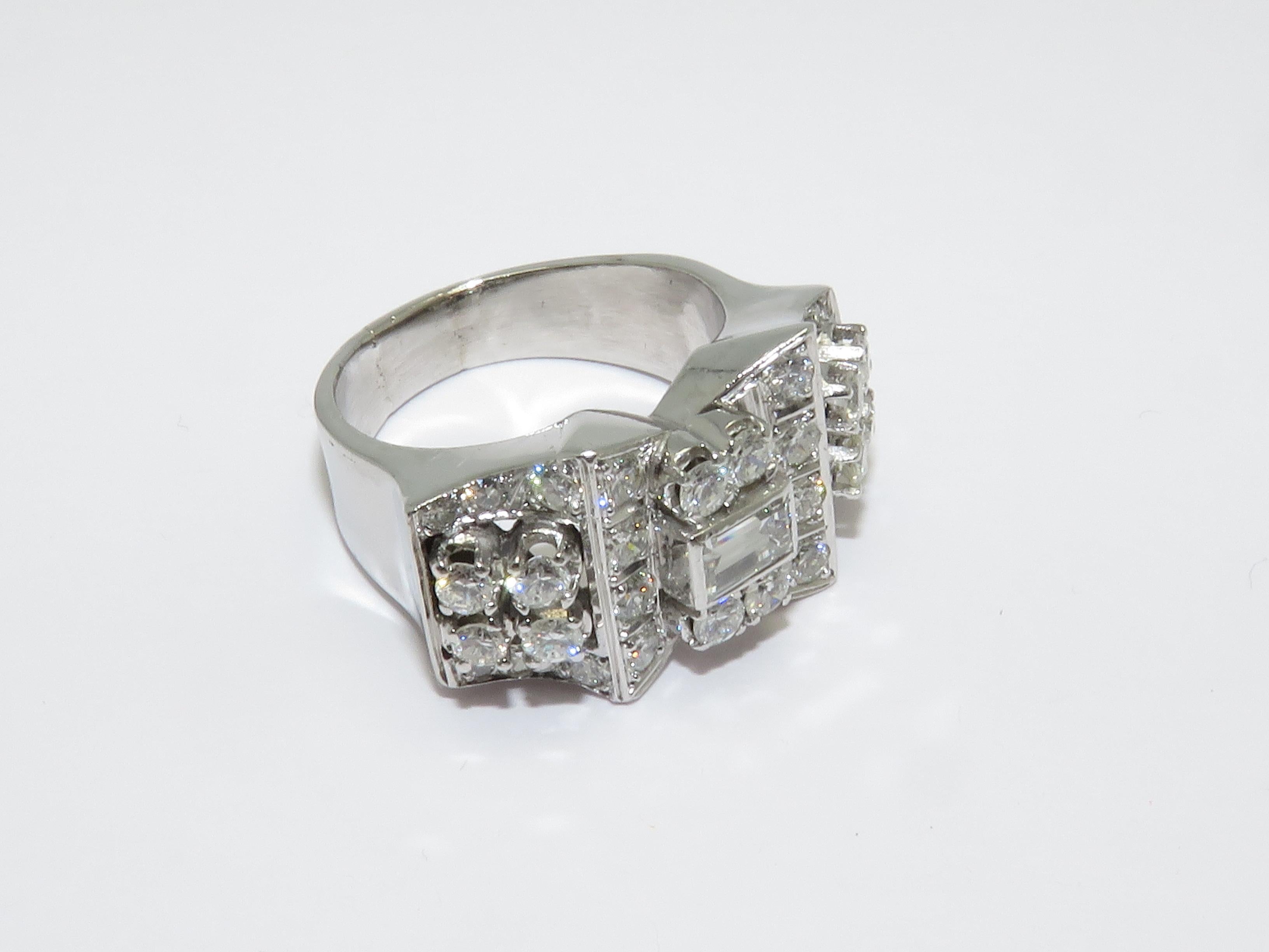 French platinum and diamond ring.
This elegant platinum ring from the Ard Deco era baguette cut diamond and round cut diamond.
Approximately 2.50 ct graded H color with Vs clarity.

It is currently size 7 1/8

Measurements:
Length: 2.30 cm   Width:
