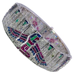 Ägyptisches Armband aus Platin mit Diamant, Rubin, Saphir und Smaragd im Art déco-Stil