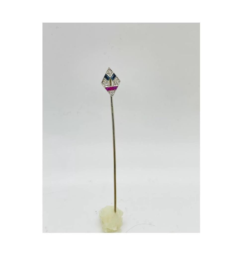 Art Deco Platinum Diamond Ruby Sapphire Stickpin

Consistent with age and use please see the photos for condition
Please ask for more photos if you need we will send them with in 24-48 hours

Due to the item's age do not expect items to be in