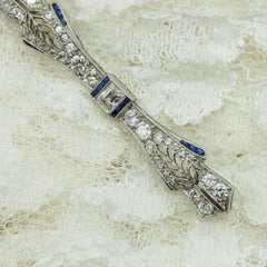 Art Deco Platinum Diamond Sapphire Bow Bar Pin Brooch