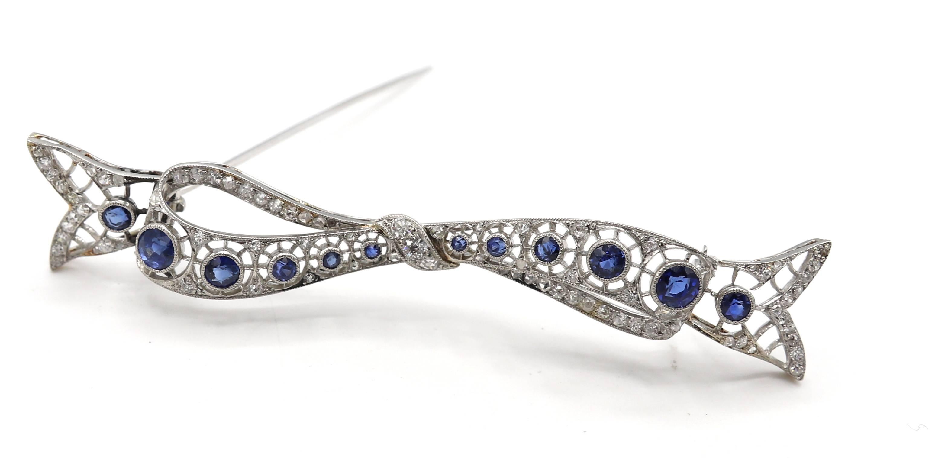 Round Cut Art Deco Platinum Natural Diamond & Sapphire Bow Brooch Pin For Sale