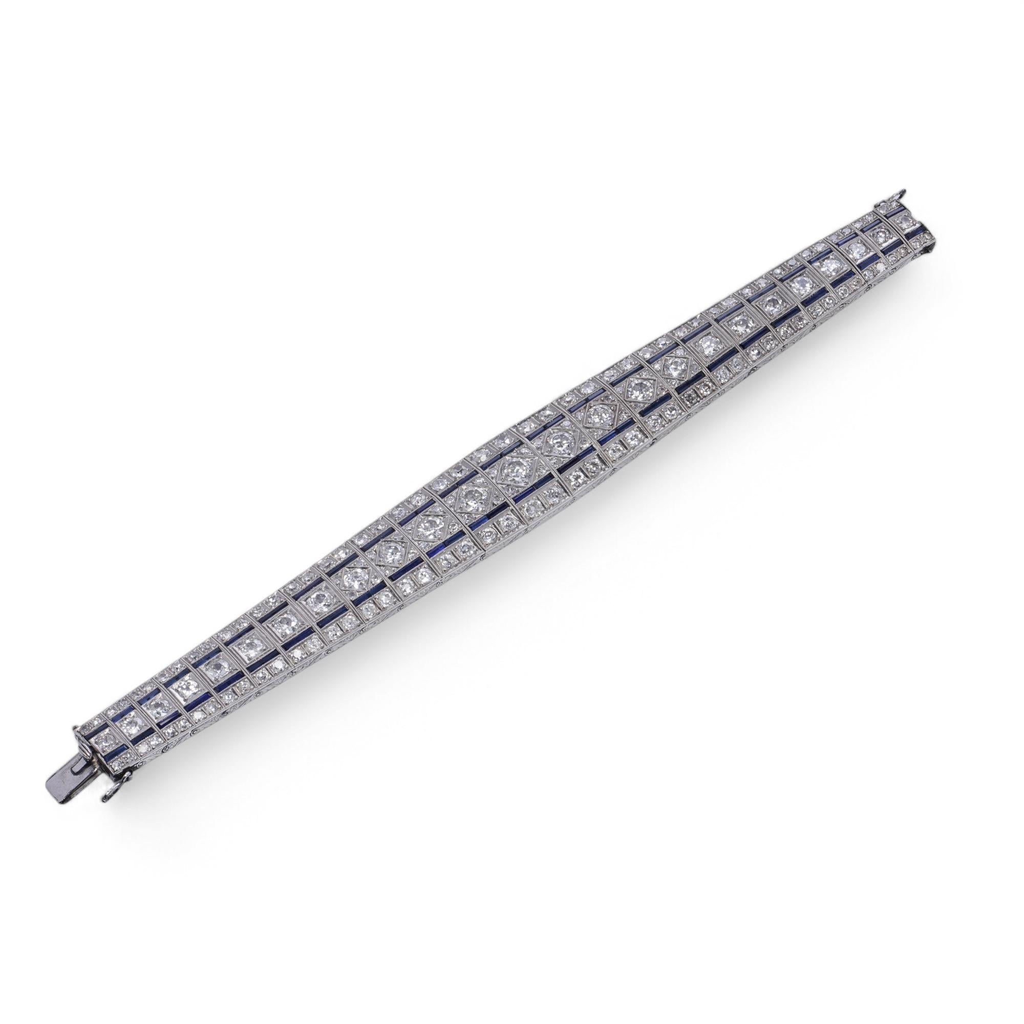 A stunning example of Art Deco craftsmanship, this bracelet features geometric diamond and sapphire designs, embodying the clean lines and elegance of the era.

Details:
Maker: Unknown
Year: Circa 1920s–1930s
Material: Platinum
Weight: 32.30