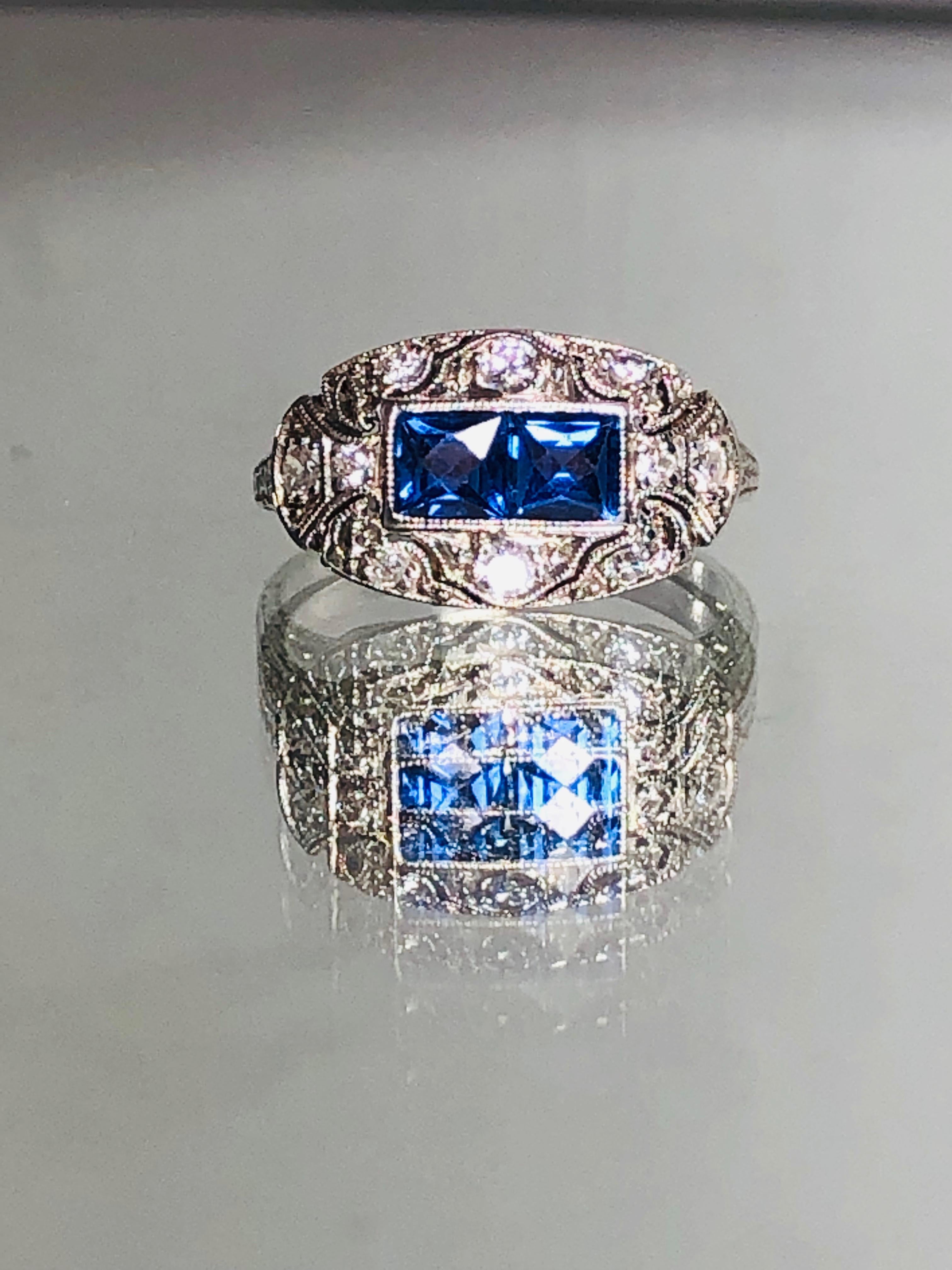 Platinum Diamond & Sapphire Ring

Art Deco ring from around 1890 Privately commissioned.

Intricate Platinum setting with two square very bright blue

Sapphires centre set each measuring approx 4mm around

1ct in total. They are rub over set with
