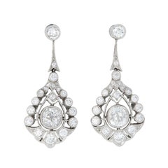 Boucles d'oreilles pendantes Art Déco en platine avec diamants en forme de gouttes